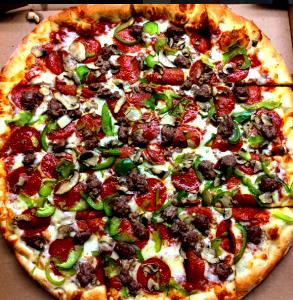 1/8 Pizza Large Deluxe Feast Pepperoni, Green Pepper, Onion, Mushroom, Sausage Feast Pizza