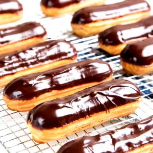 1 Cream Puff (3-1/2" X 2") Chocolate Glazed Eclairs (Custard Filled)