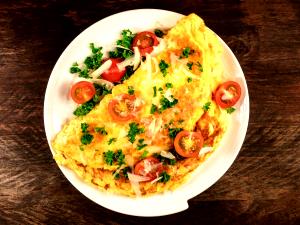 1 Extra Large Egg Omelet or Scrambled Egg with Onions, Peppers, Tomatoes and Mushrooms