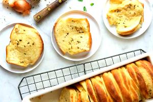 1 Large Slice (5" X 2-1/2" X 1") Garlic Bread