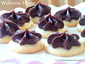 1 Medium Butter or Sugar Cookie with Chocolate Icing or Filling