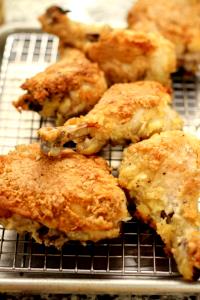 1 Medium Piece (yield After Cooking, Bone Removed) Baked or Fried Coated Chicken with Skin