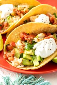 1 Miniature Taco or Tostada with Fish, Lettuce, Tomato and Salsa