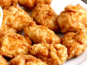 1 Oz Chicken Breast Meat and Skin (Broilers or Fryers, Flour, Fried, Cooked)