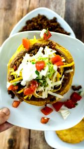 1 Piece Tostada with Beans, Beef and Cheese