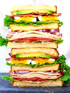 1 Sandwich Bacon, Chicken and Tomato Club Sandwich with Lettuce and Spread on Multigrain Roll