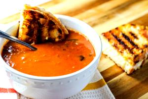 1 serving (13.7 oz) Tomato Basil Soup and Grilled Cheese Panini (1200)