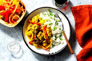 1 serving Braised Beef Panang Curry with Jasmine Rice and Sweet Peas