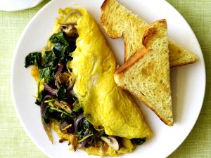 1 Serving Fresh Spinach And Mushroom Omelette - Special Request No Cheese, Dry Sourdough Toast, Egg Substitute, And Fresh Fruit İnstead Of Potatoes