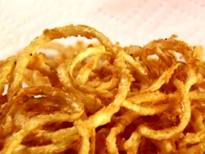 1 Serving Onion Rings & Strings