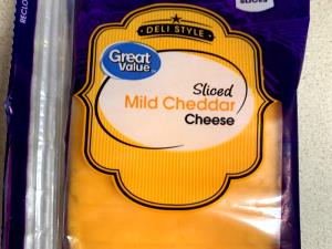 1 Serving Sliced Medium Cheddar Cheese