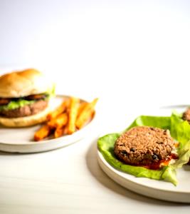 1 Serving Spicy Black Bean Cheeseburger With Sweet Potato Fries, Deviled Egg And Pineapple Salad