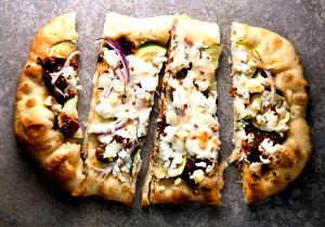 1 serving Sun Dried Tomato and Goat Cheese Pizza (Half Plank)