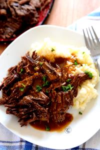 1 Slice With Gravy And Stuffing Puerto Rican Style Stuffed Pot Roast (Assume with Gravy and Stuffing)