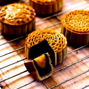 1 Small Round Moon Cake Oriental Pastry (made with Bean or Lotus Seed Paste Filling, Baked)