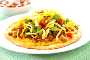 1 Taco Bell Taco or Tostada with Beans, Cheese, Meat, Lettuce, Tomato and Salsa