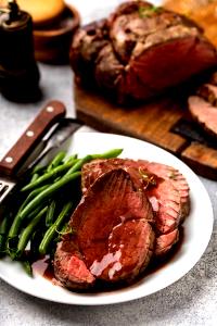 100 G Beef Tenderloin (Trimmed to 1/2" Fat, Prime Grade, Cooked, Roasted)