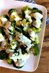 100 G Cooked Broccoli with Cheese Sauce